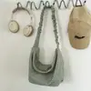 Bolsa xadrez transfronteiriça para mulheres, nova bolsa de ombro casual de verão 2026 para aula e trajeto, bolsa transversal tipo bolinho de grande capacidade