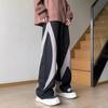 Pantalones de estilo americano para hombre, marca de moda de otoño e invierno, pantalones de calle con cremallera a juego de colores retro, pantalones casuales holgados de pierna ancha