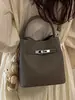 Bolso de Mano Pequeño Estilo Coreano para Mujer, Nuevo Bolso de Hombro Vintage Primavera 2026 para el Trabajo y los Viajes Diarios, Bolso Cruzado Tipo Cubo