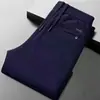 Calças Casuais Outono e Inverno Masculinas Grossas Largas de Veludo Cotelê Versáteis para o Trabalho Moda Calças de Moletom Masculinas Calças de Perna Reta