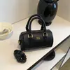 Bolsa de Hombro de Moda Versátil Exquisita de Gran Capacidad para Mujer Verano 2026 Estilo Commuter Cruzada Bolso Cilíndrico