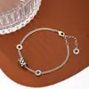 Liyin accesorios de moda puntada de tablero de ajedrez pintura adornos redondos para la mano personalidad geométrica pulsera de estilo neutro versátil