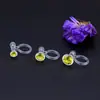 Clip para oreja pequeño japonés transparente con incrustaciones de circonita, aretes de resina transparente para protección del medio ambiente, fabricantes de joyería popular callejera de Internet al por mayor