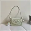 Bolsa de Ombro com Laço para Mulheres 2026 Novo Estilo Fresca e Doce Bolsa de Mão de Alto Padrão Bolsa de Ombro Transversal Fashion para o Dia a Dia
