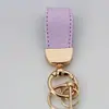 Marca de moda patrón de cordero llavero corto llavero cabeza de rábano llavero de regalo pequeño llavero de cuero charm simple para bolso
