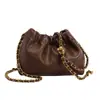 Bolso de nicho versátil tipo ins para mujer 2024 nuevo bolso de cubo retro de moda bolso de mensajero con cadena de alta calidad de Corea del Sur