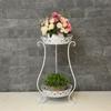 64 # Venta al por mayor del fabricante Estilo Europeo Soporte de Flores de Hierro Doble Capa Interior con Macetas Balcón Exterior de Pie Soporte de Macetas de Flores de Múltiples Capas