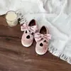 Zapatos de Princesa de Terciopelo Dorado con Lazo Cruzado Estilo Coreano para Niñas 2026 Nuevas Llegadas de Otoño Zapatos Individuales Versátiles de Suela Suave para Niños