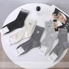 Nuevos Calcetines de Miu Estilo para Mujer Primavera y Otoño, de Media Pantorrilla, Doble Puño, Color Sólido, Calcetines Deportivos Simples, Productos Europeos de Nicho