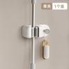 Clip para mopa baño inodoro pared colgar sin agujeros estante fijación escoba estante almacenamiento mopa estante gancho venta al por mayor