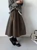 La nueva colección de otoño de Juzhi presenta una falda retro de cintura alta y caída estilo coreano para mujer, holgada y con un bajo amplio 32607