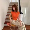 Comércio Exterior Roupas Femininas Coreanas Dongdaemun Novo Estilo Temperamento Cor Sólida Abotoado Slim Fit Mostra a Figura Respirável Versátil Manga Curta Malha