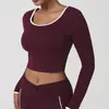 Nova Camiseta Nude de Manga Longa com Gola Redonda Europeia e Americana Costas Abertas Curta Roupa de Yoga Outono e Inverno Roupa para Corrida ao Ar Livre Fitness Top