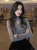 Otoño e invierno nuevo diseño hueco estilo extranjero negro cuello alto camisa base manga larga corte ajustado delgado top de chica hot moda
