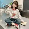 Camiseta de manga larga a rayas de algodón puro para niña, nuevo estilo primavera y otoño 2026, holgada y elegante, camiseta básica versátil para niños
