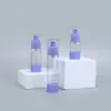 Botella cosmética transparente morada al por mayor para rellenar, botella de 15 ml, 30 ml, 50 ml, botella para rellenar loción tipo push