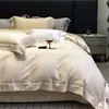 Conjunto de quatro peças em algodão Tencel amigo da pele Classe A para dormir sem roupa, luxo leve com toque de alta qualidade, conjunto de cama lençol e capa de edredom jacquard luxuoso na cor champanhe 4
