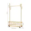 Perchero de pie de lujo ligero personalizado para dormitorio, perchero de metal con ruedas y cesto para ropa sucia, estante de almacenamiento de pie para uso doméstico