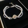 Pulseira de Rede Azul Dourada com Flor de Vidro Pérola Zircônia Brilhante Pulseira Elegante de Luxo Leve Joia de Mão Versátil da Moda