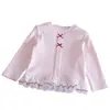 Top de punto dulce para niñas 2026 Primavera y Otoño Nuevo Estilo Coreano Lazo Versátil Encaje Patchwork Camisa Básica