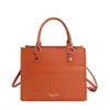 Nova Bolsa Tote de Ombro Único Cruzada Cor Sólida Estilo Verão 2025, Bolsa de Mão Prateada Fashion e Versátil para Mulheres