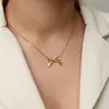 Pendientes Jieding de Acero Inoxidable con Lazo y Corazón de Circonita, Clavos de Oreja de Lujo Ligero de Gama Alta, Joyería Transfronteriza de Acero de Titanio
