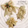 Venta al por mayor de fábrica Accesorios de Navidad Adornos forma tridimensional Adornos de pared Lazo Colgantes de árbol de Navidad Suministros de decoración