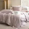 Ropa de cama de lujo ligero moderno, color sólido, encaje, alta gama, amigable con la piel y transpirable, juego de cuatro piezas de algodón Tencel, textil para el hogar