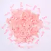 Combina y mezcla varias formas de rellenos de confeti para globos para crear un ambiente de fiesta y decorar el salón de bodas con purpurina.