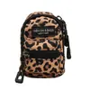 Mini bolso coreano para niños, popular en comercio exterior, con estampado de leopardo, para niñas, bolso bandolera para viajes al aire libre, bolso para auriculares, sobre rojo con boca abierta