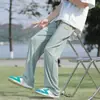 Pantalones Casuales para Hombre Primavera y Otoño 2026 Nuevo Estilo Holgado Caída Pierna Recta de Moda Marca Ins Pantalones Deportivos Color Sólido con Parche