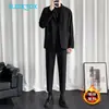 Pantalones de traje ajustados, sin planchar, estilo business casual para otoño e invierno, ropa casual para hombre, pantalones de traje negros de nueve puntos, fluidos