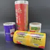 Película en rollo para envasado de alimentos personalizada, película compuesta aluminizada impresa a color, película en rollo para máquina de envasado automático