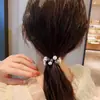 Nueva Pulsera de Perlas Cuerda para el Cabello Elegante para Mujer Todo-partido Cuerda para la Cabeza Bola de Payon de Grado Superior Banda de Goma Accesorios para el Cabello para Mujeres