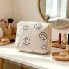 Bolsa de maquillaje suave de pana con cara sonriente y compartimentos internos, bolsa de almacenamiento portátil para estudiantes, adecuada para cuidado de la piel, artículos de tocador y productos de belleza