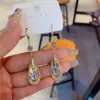 2025 Novos Cristais Roxos da Moda de Alta Qualidade em Formato de Gota para Orelha, Brincos Simples e Elegantes, Acessórios de Orelha Modernos e Estilosos