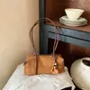 Bolsa de Pelúcia Camurçada Feminina 2026 Nova Outono Retro Milanesa para o Trabalho Bolsa de Ombro Único Moda Versátil Bolsa de Axila