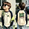 Ropa interior térmica de forro polar para niños 2026 Otoño/Invierno Nuevo estilo Camiseta de manga larga con cuello redondo y bloques de color para niños Ropa de Otoño/Invierno
