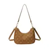Bolso de axila transfronterizo modelo nuevo 2026 bolso cruzado con estampado vintage para mujer, bolso de hombro de alta gama negro gofrado para damas
