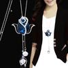 Collar largo de cadena para suéter con accesorios florales transfronterizos para mujer, colgante de borla de cristal, colgante para ropa, joyería simple al por mayor