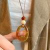 Collar con colgante de anillo de resina estilo chino vintage para mujer, cadena de clavícula larga de cuero de alta calidad, accesorios para suéter