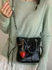 2026 Verano Nuevo Bolso Cubo de Cadena de Rejilla de Diamante Moda Tendencia Elegante y con Estilo para el Trabajo y el Trayecto Bolso de Hombro