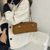Nueva Bolsa de Bolos con Patrón de Diamante Súper Caliente de un Solo Hombro 2026 Bolsa para Mujeres para el Trabajo Cadena Debajo del Brazo Sensación de Bolsa Otoño Invierno