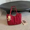 Bolsa tote plissada de nicho estilo coreano para mulheres, novo modelo outono 2026, bolsa de grande capacidade para estudantes universitários, bolsa de ombro para o dia a dia