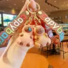 Lindo creativo bebida té con leche sostener tortuga capibara muñeco llavero colgante de bolsa llavero para llaves de coche pequeño regalo