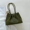 Bolso de mano grande para mujer, modelo nuevo de verano 2026, alto valor estético, color sólido, único, tejido de nicho para la ciudad