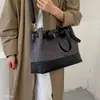 Bolso de Mano Simple de Gamuza Versátil Nuevo Estilo 2026 Popular Bolso Suave Casual Gran Capacidad Bolso para Viajes al Trabajo Súper Caliente para Mujeres