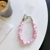 Correa de muñeca de seda plisada de alta calidad estilo nicho, nuevo colgante para funda de teléfono móvil, bolsa corta de red para regalo