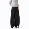 Pantalones de chándal blancos y grises con dobladillo curvo para hombre, pantalones largos versátiles y de caída libre de moda para otoño, pantalones deportivos casuales de corte recto y holgado.