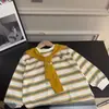 Camiseta de Manga Comprida Infantil 2026 Outono Nova Estilo Coreano Listrada Gola Redonda para Meninos Moda Blusa Estilo Duas Peças com Gola